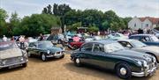 Classic cars on display at Epping Ongar Railway's North Weald Station.
