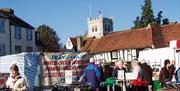 Waltham Abbey Market stalls with the church in the background