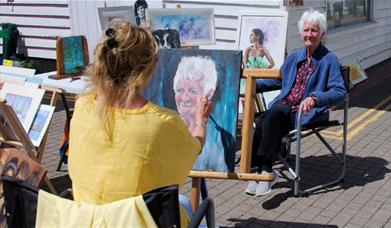 Sue Hodgson demonstrating portraiture at last year's Art on the Quay