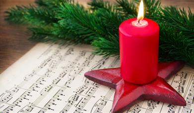 Christmas candle and music