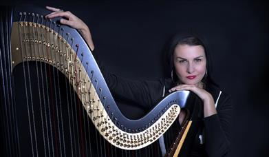 Alina posing with Harp
