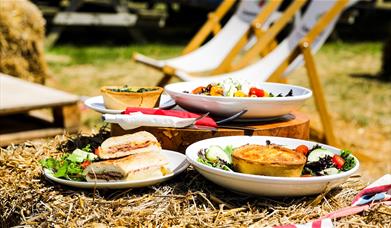Food on Straw Bales with Deckchairs at Cammas Hall Farm