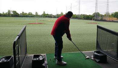 Man playing Topgolf