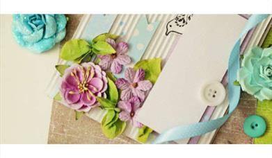 Papercraft flowers, buttons and ribbon