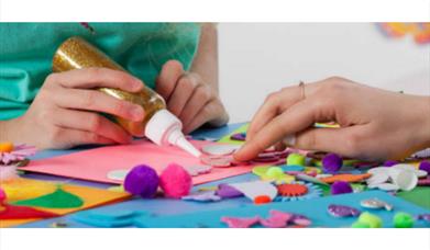 Children's hands doing crafts