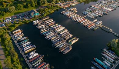 Roydon Marina Grounds, boat sales, boat house cafe bar, holiday lodges, residential lodges, leisure moorings.