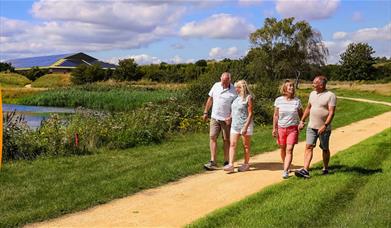 Guests enjoying a walk outside at Potters Resorts Five Lakes