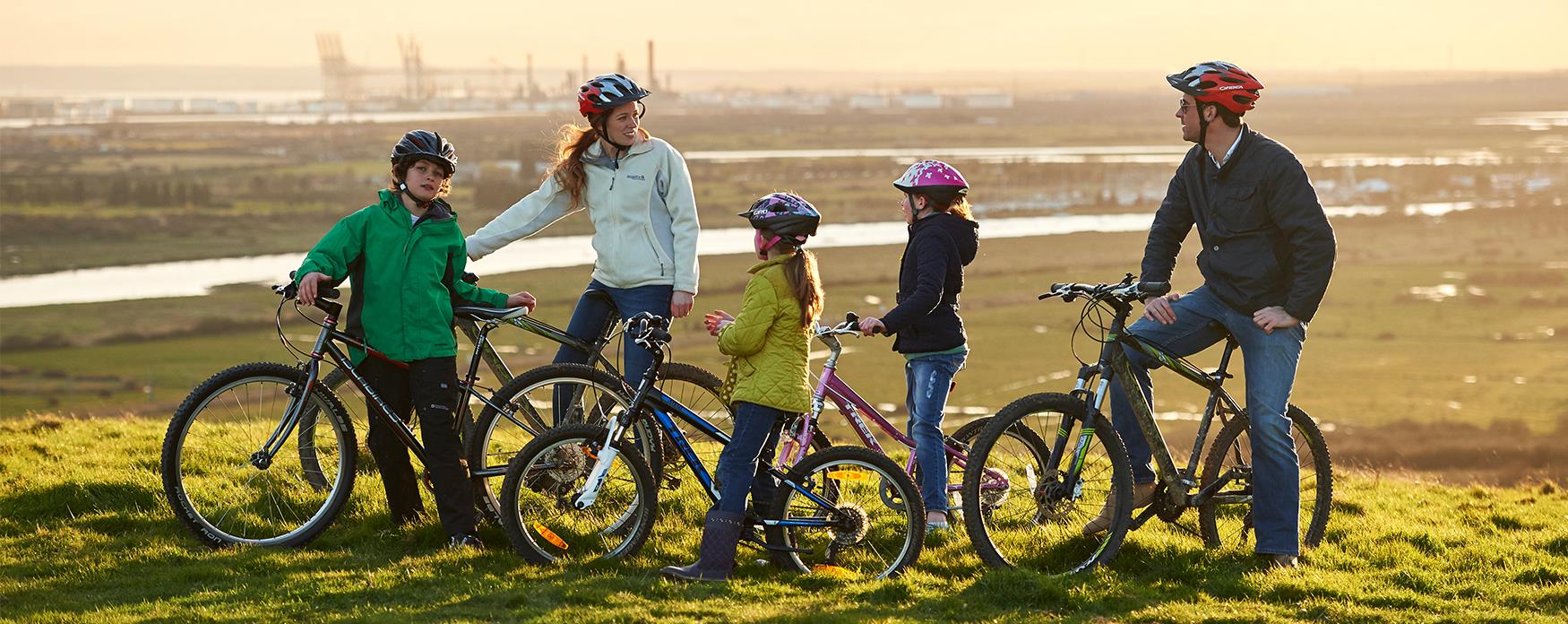 A family cycling at Hadleigh Country Park