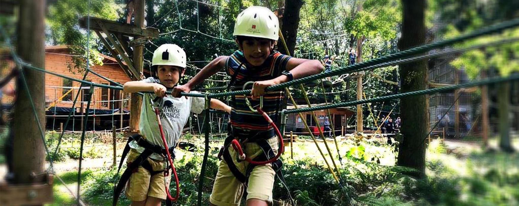 Two boys on a rope park