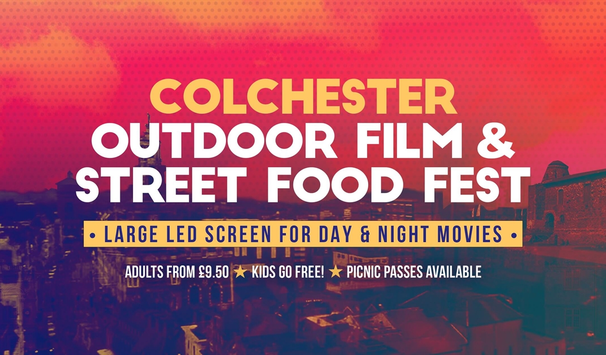 Colchester Outdoor film and street food fest, white writing on a red tinted photograph of castle park