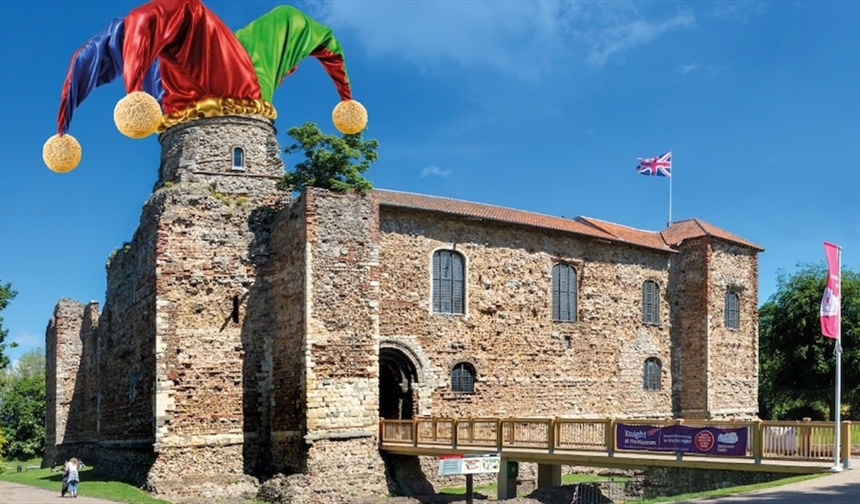 Colchester Castle with a Jester's hat photoshopped on to a turret.