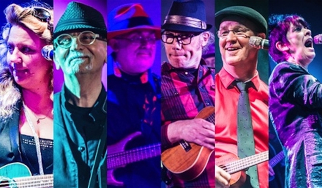 D'Ukes playing with ukuleles