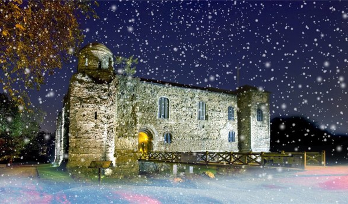 A christmassy coasting of snow and snowfall superimposed on an image of Colchester Casle