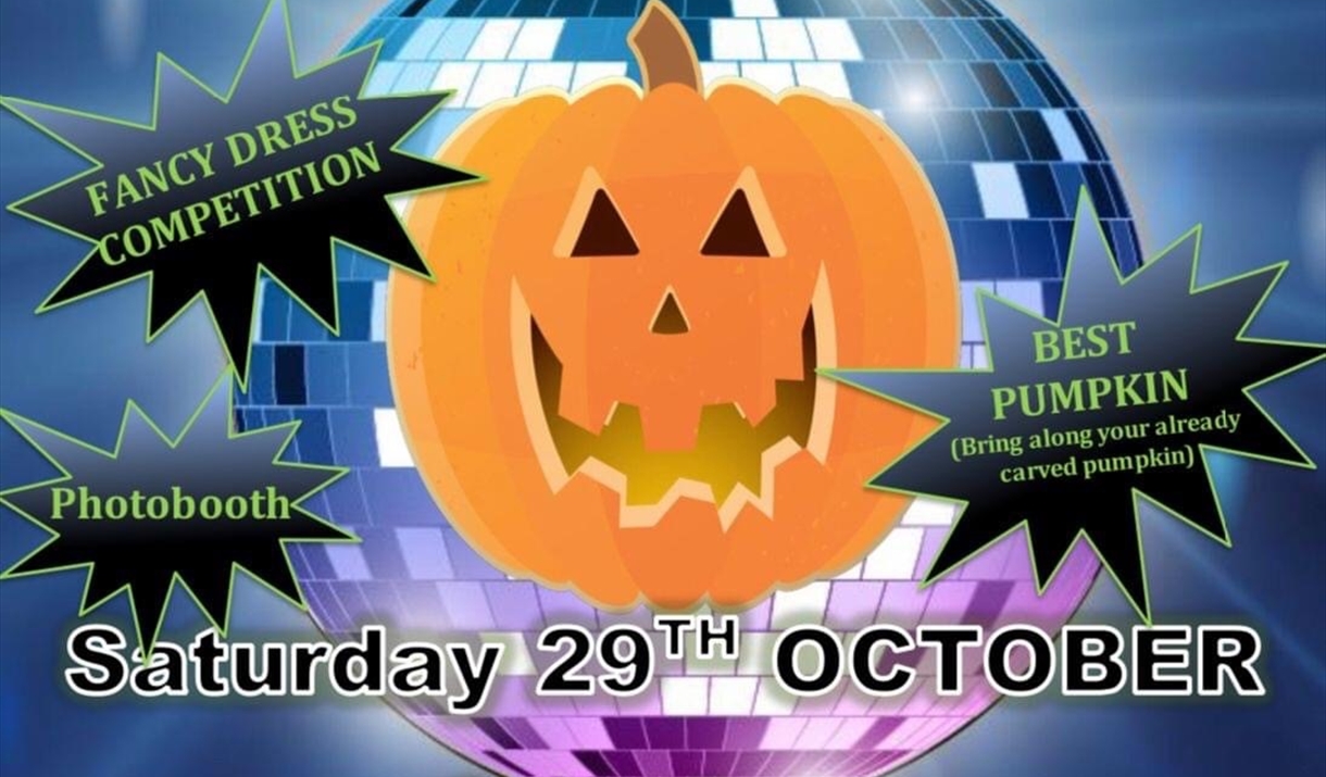 Pumpkin at centre of disco ball for Halloween Disco at Steeple Bumpstead village hall