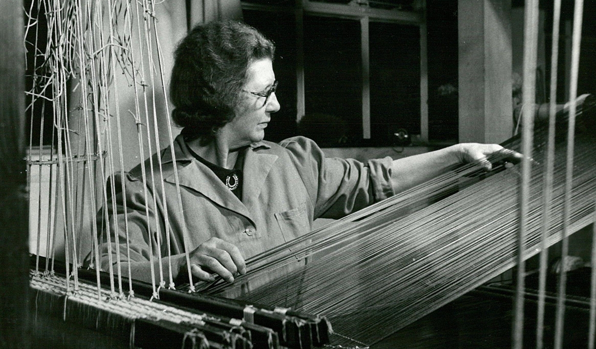 Archive photo of Hilda Carver making purple velvet from Warner Textile Archive