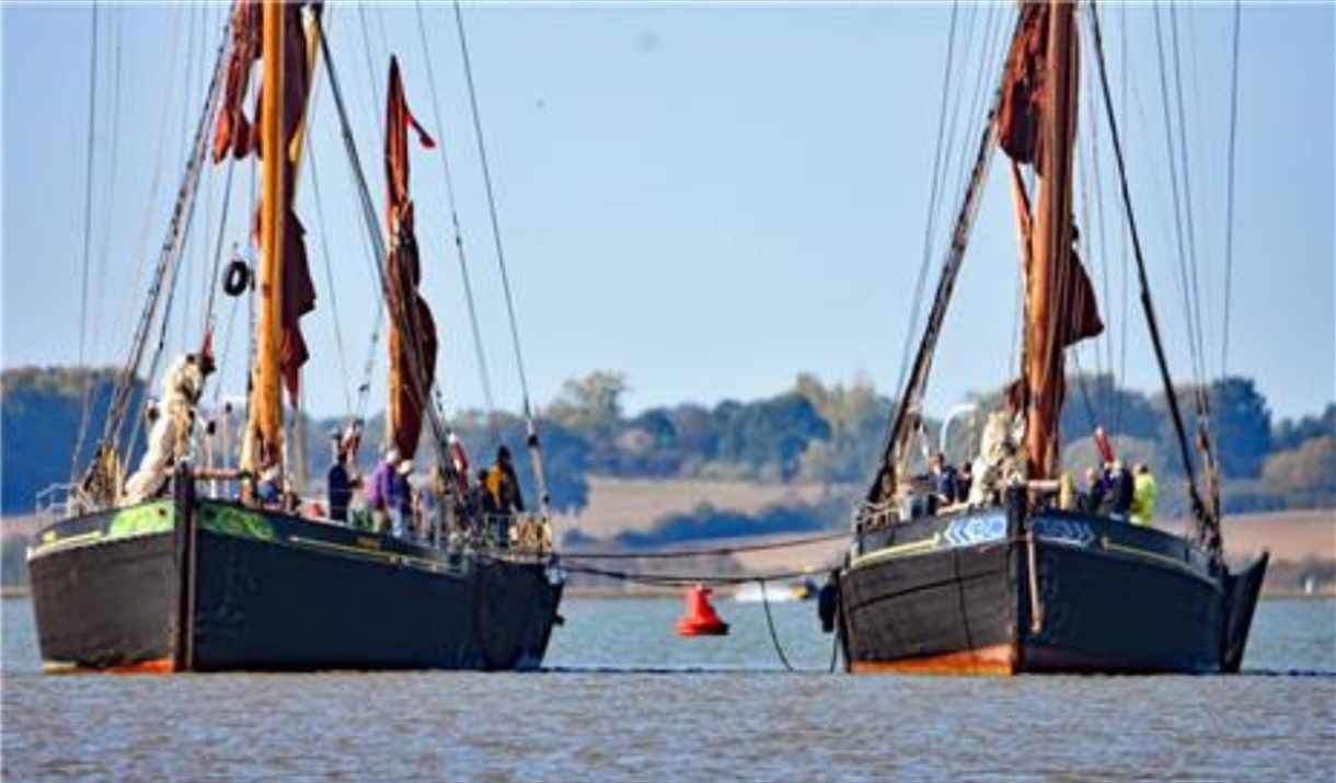 Two Thames Sailing Barges out on the water