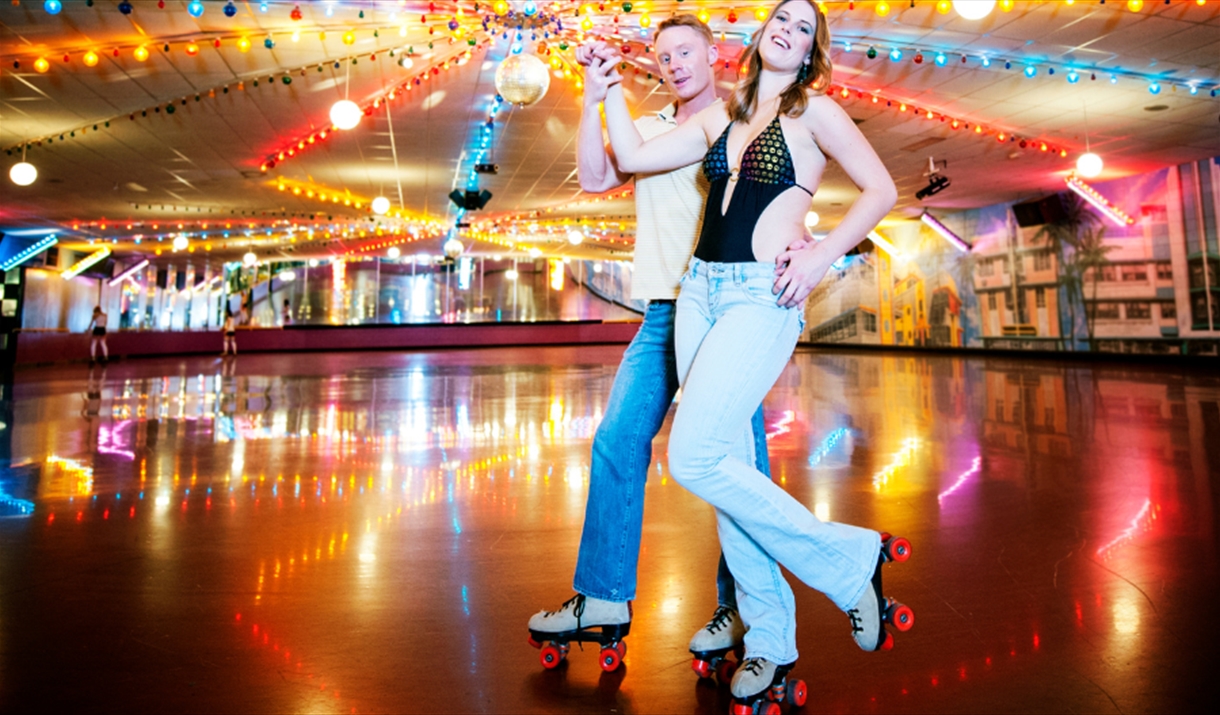 Couple roller skating