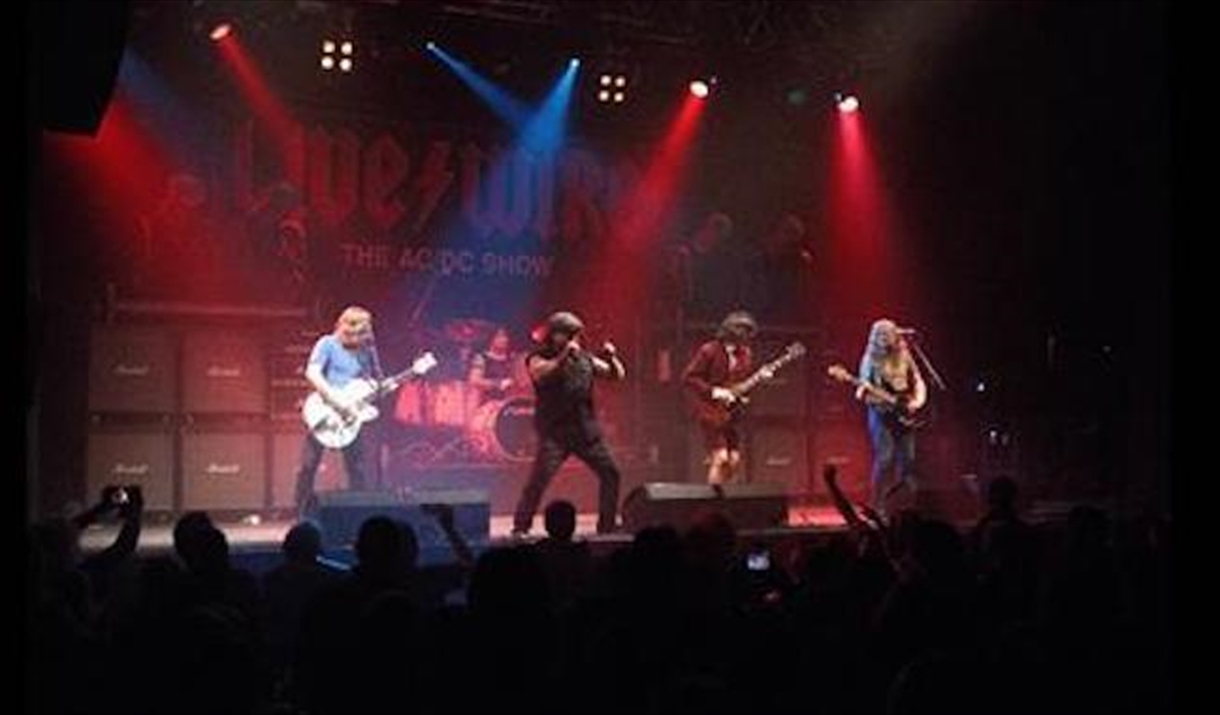 Live/Wire performing on stage