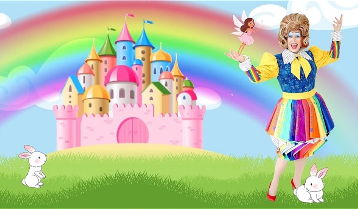 Pantomime dame with pink fairy castle and rainbow.
