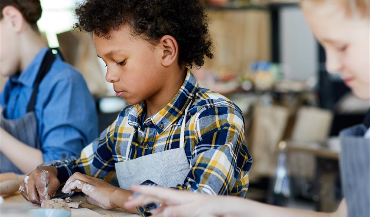 Children modelling with clay