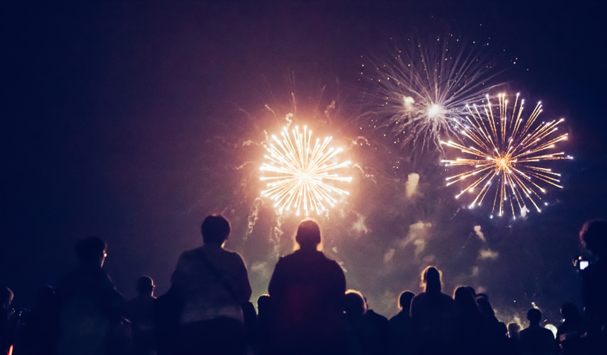 People watching a fireworks display