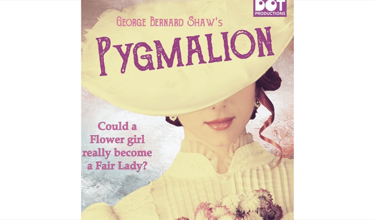 Girl holding flowers with her hair partially hidden by a hat