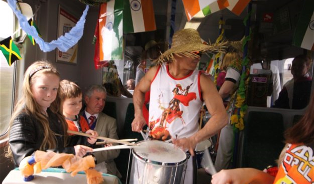 Drummer on train