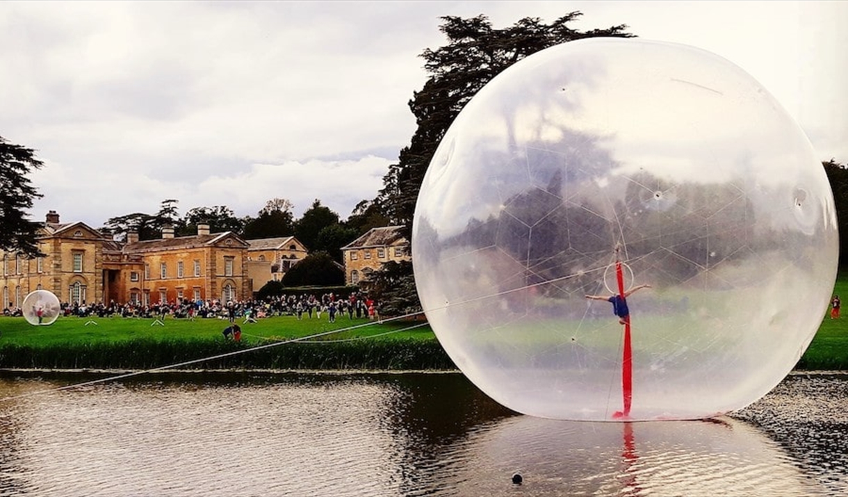 A large inflatable sphere on a lake