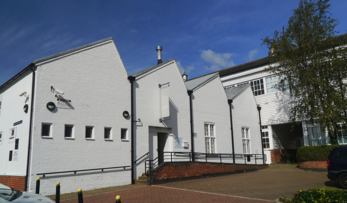White building with essex weather board which houses Warner Textile Archive in Braintree