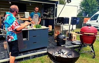 Cooking demonstration at Smoke & Fire Festival