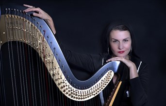 Alina posing with Harp