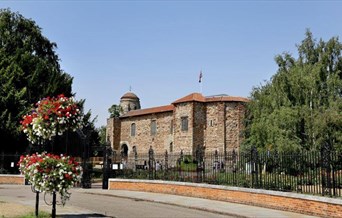 A view of Colchester Castle through the Cowdray Crescent gates