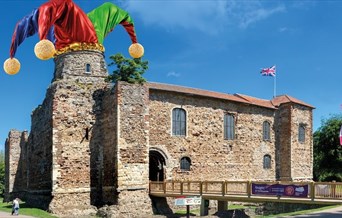 Colchester Castle with a Jester's hat photoshopped on to a turret.