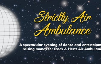 Strictly Air Ambulance black background with glitterball