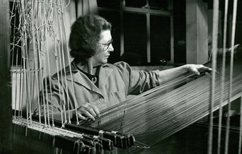 Archive photo of Hilda Carver making purple velvet from Warner Textile Archive