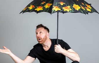 Jason Byrne Under an Umbrella