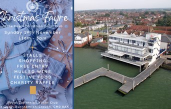 Christmas poster next to aerial view of yacht club