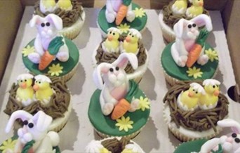 Cupcakes decorated with sugarpaste bunnies and chicks