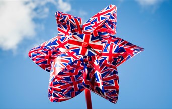 Child's paper windmill made from Union Jacks