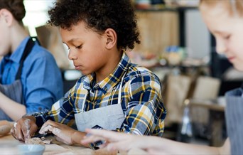 Children modelling with clay