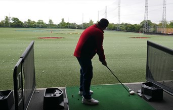 Man playing Topgolf