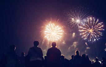 People watching a fireworks display