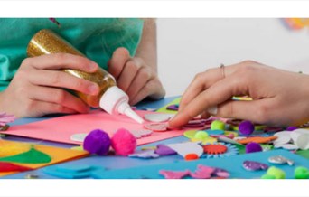 Children's hands doing crafts