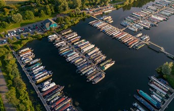 Roydon Marina Grounds, boat sales, boat house cafe bar, holiday lodges, residential lodges, leisure moorings.