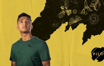 A young refugee looks into the middle distance