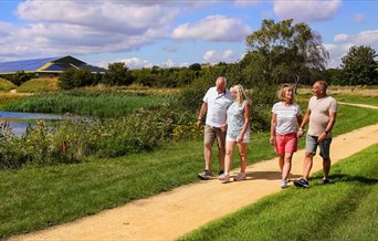 Guests enjoying a walk outside at Potters Resorts Five Lakes