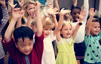 a group of children having fun and smiling