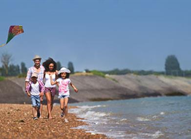 Family Kite Flying at Mersea