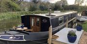 Front deck with steps down onto the bow of the boat to access the double front doors