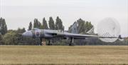 Vulcan XL426 deploys its braking parachute on the London Southend Airport runway during a high-speed taxi-run.